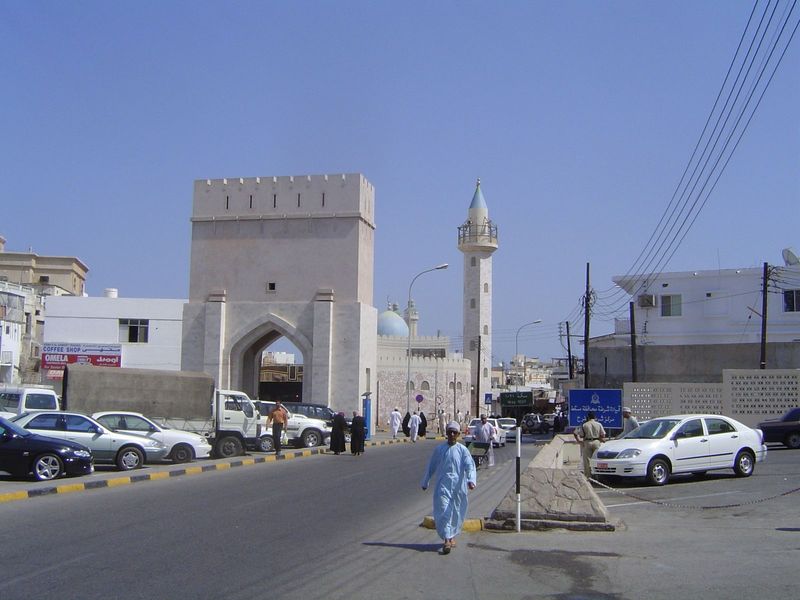 Behind it, Muttrah's Shijayiyah Market is open.