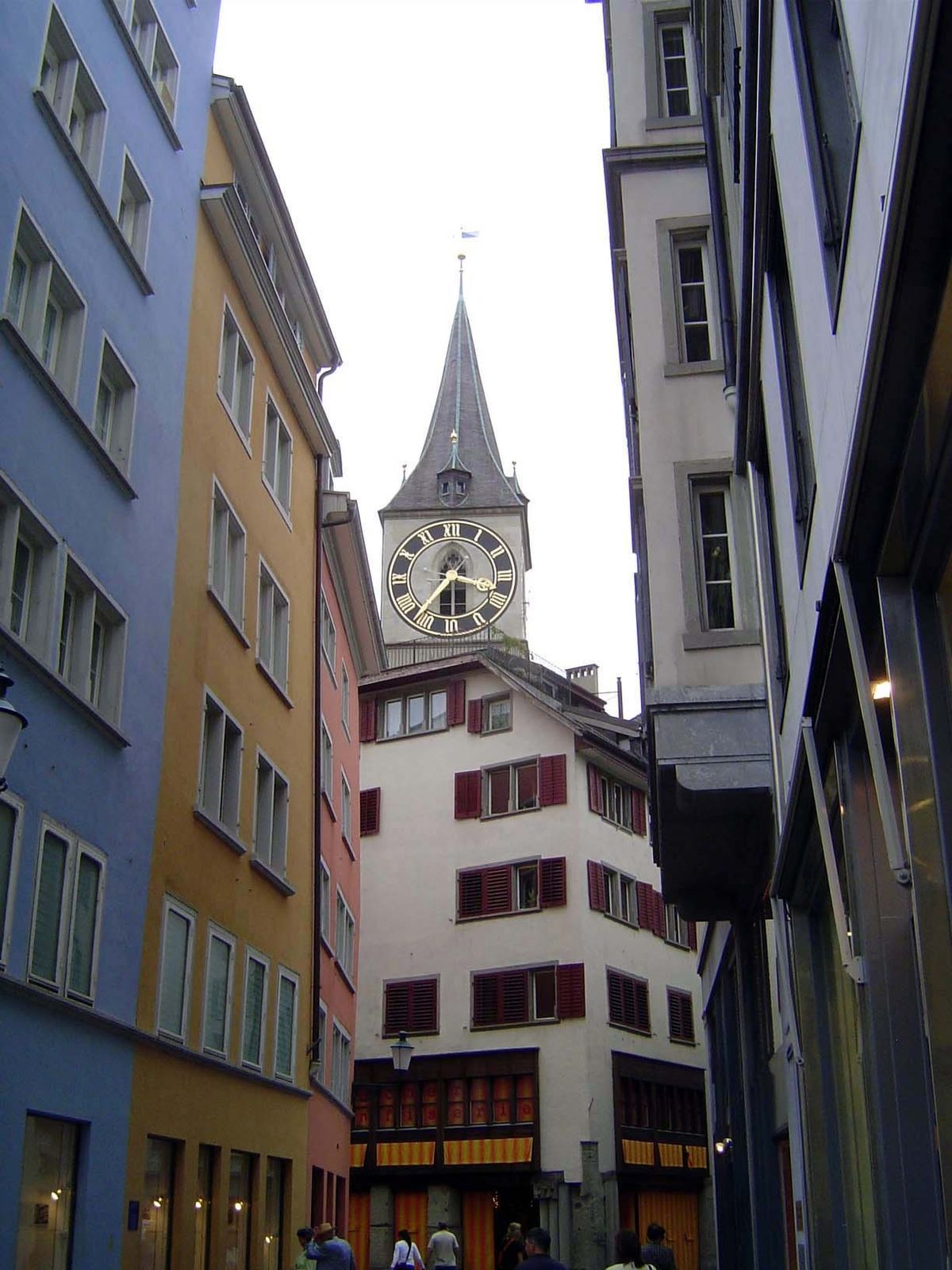 The older part of the city hugs the river and prospers with tourists, seemingly oblivious of high prices. The peeping spire belongs to the P