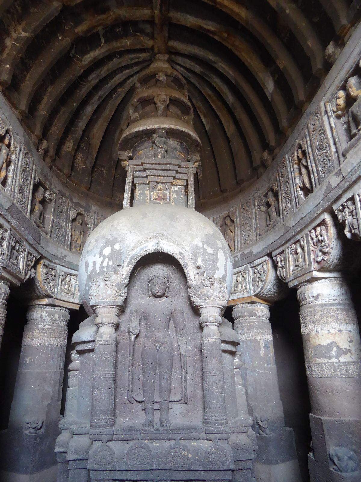 The chhatra is one of the Eight Auspicious Symbols of Buddhism. Like the tiny figures supporting them?