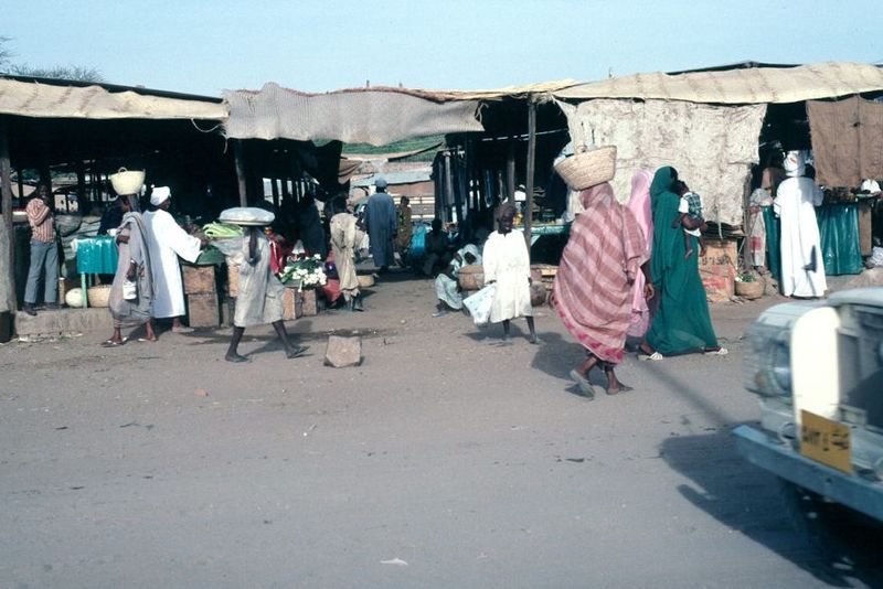 The marketplace in El Obeid, on the north side of the Nuba Mountains. Despite a range of vegetables, the staples are sorghum mush and a slip