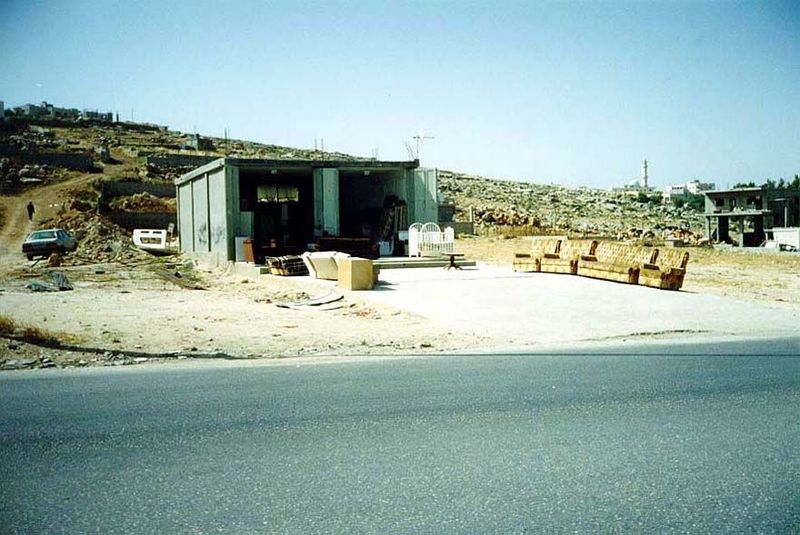 Just south of Bethlehem is the much-visited Daheisha refugee camp. It fronts the Hebron Road, shown here with a furniture store across the r