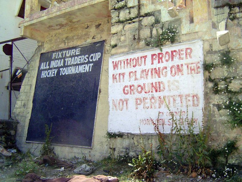 Under the white lettering, an almost illegible inscription commemorates the landslide.