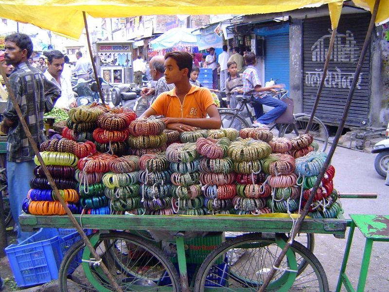 At a city market: a cartload of bangles for sale.
