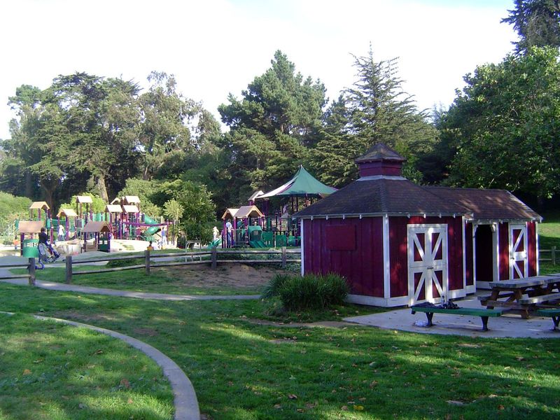 There was a little barnyard with a cow and sheep and donkey to pet. All that new playground stuff in the distance replaces honest slides and
