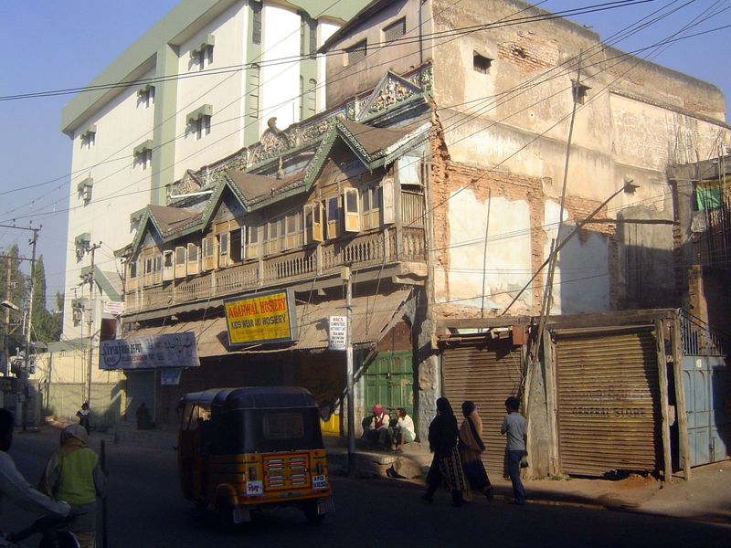 The architecture now becomes a hodge-podge of new and old, maintained and ramshackle.
