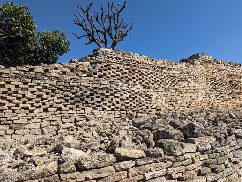 Double herringbones and a bit of chessboard, almost certainly rebuilt.
