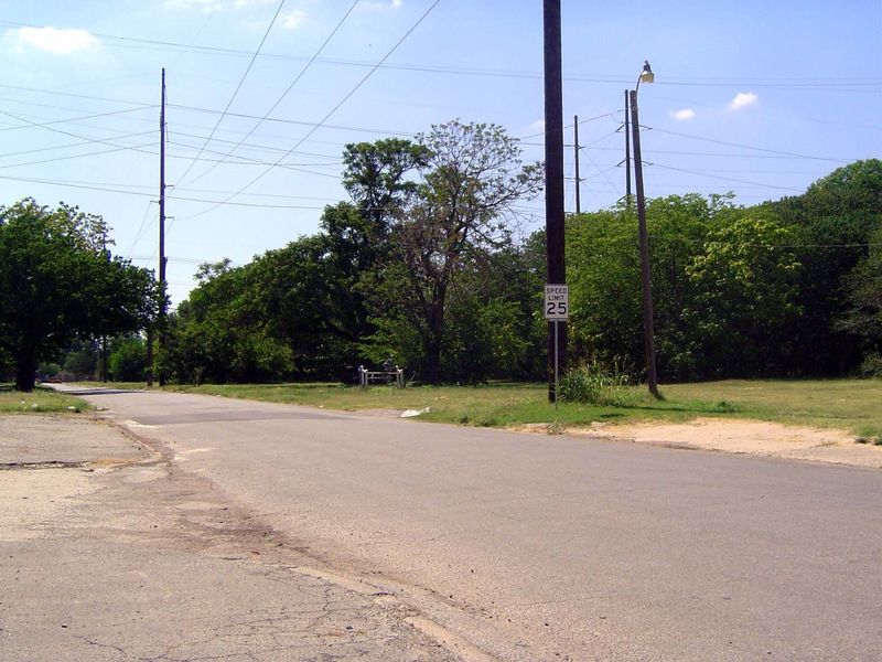 Many blocks between the old and new highways stand vacant, awaiting redevelopment.