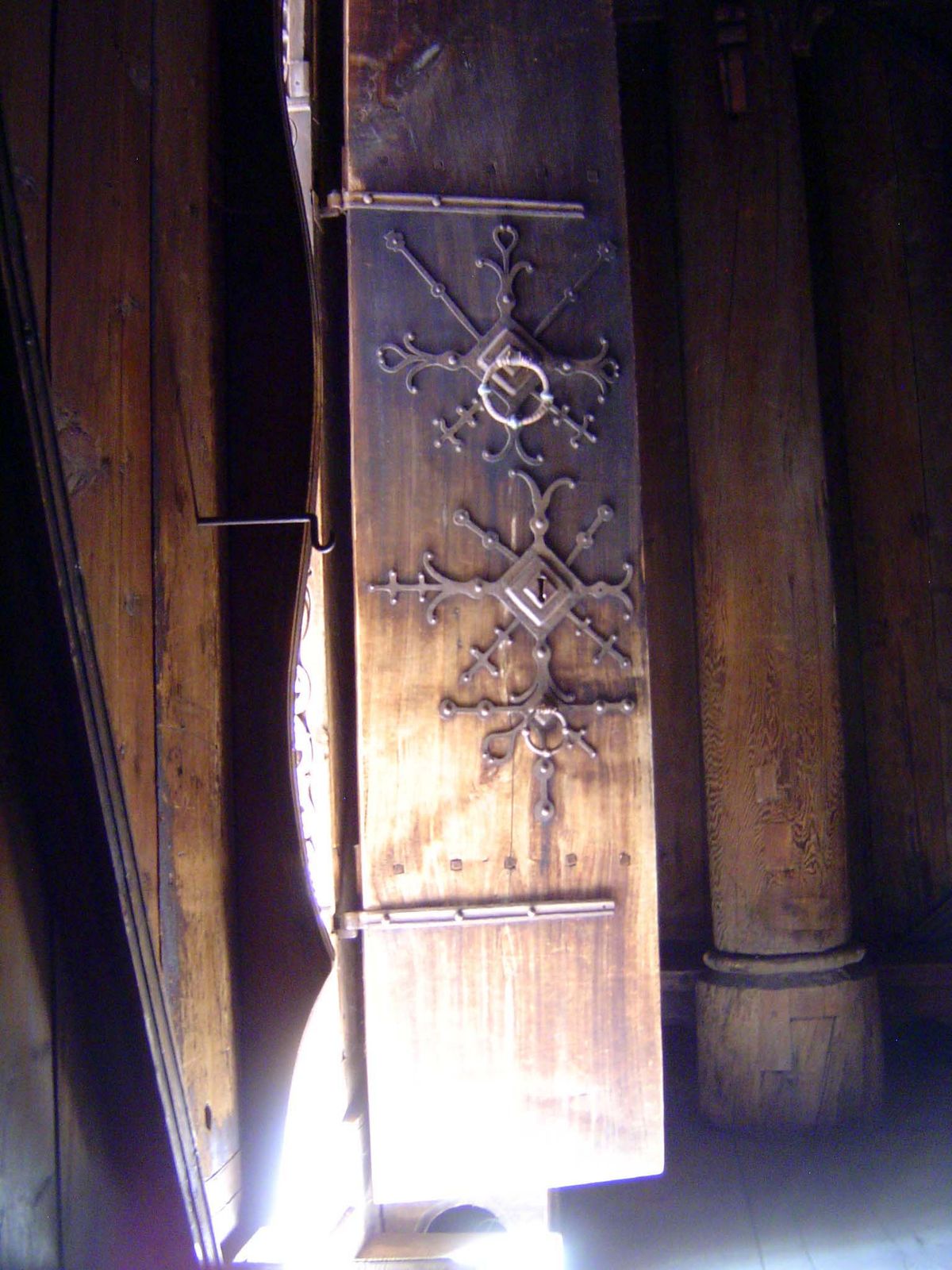 Door proper, with one of the original timber staves at the far right.