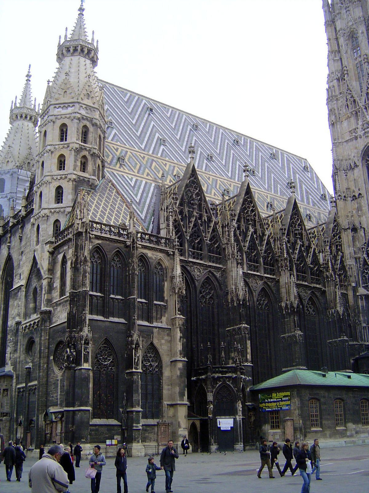 The main facade of St. Stephens was finished about 1230, but these things are hardly ever really finished, and the four decorative gables on