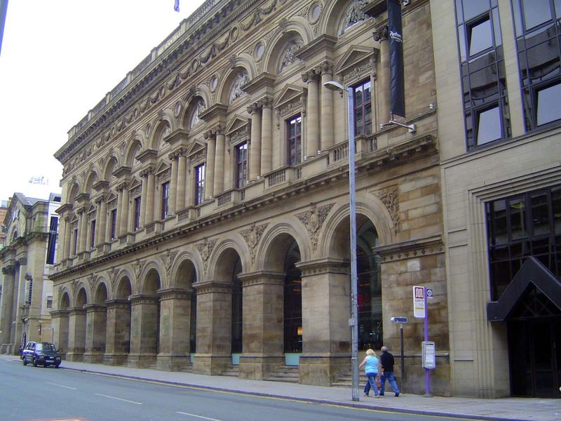 The city's industrial wealth supported the development of a massive downtown. Here, the Free Trade Hall of 1853-56. Pevsner admired it great
