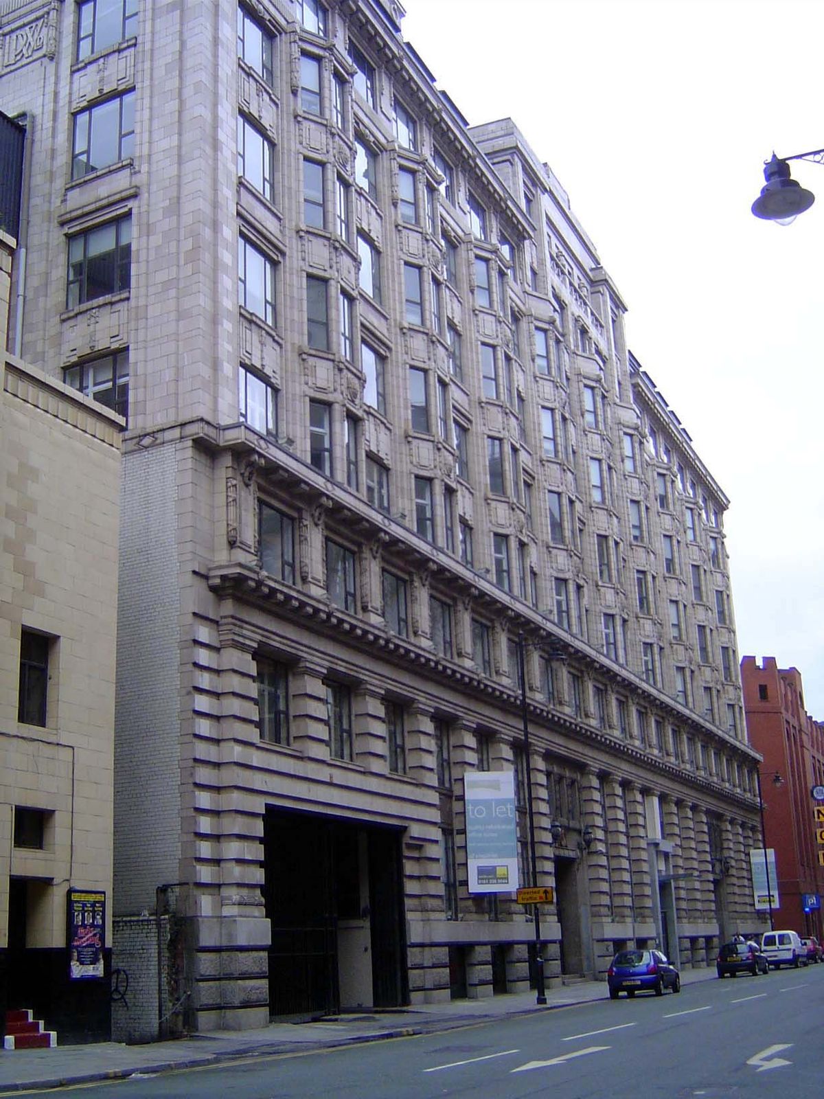 Another case: Bridgewater House, designed by Fairhurst and built about 1912. Its height rose to the 108-foot limit imposed by the city.