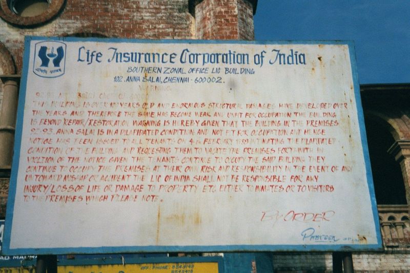 The sign says that the building is deemed unfit for occupation: irreparable structural damage. Plans in 2006 by the LIC to demolish the stru