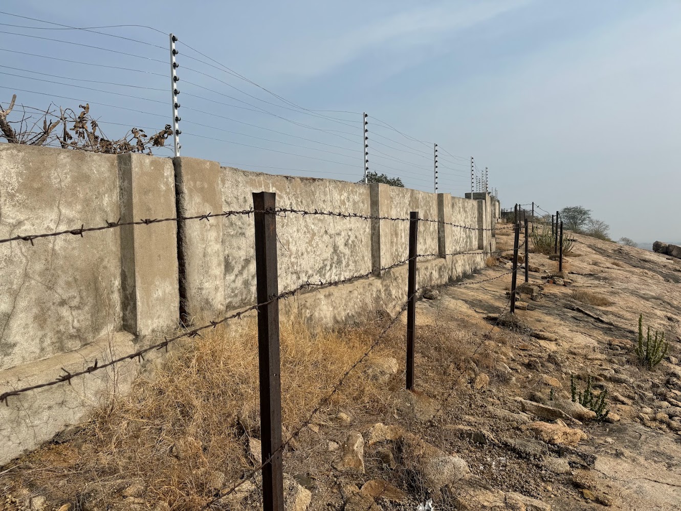 Triumph and failure: a fence at the top.