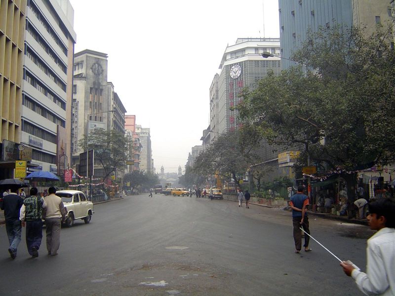 We'll circle back downstream from the bridge. Some of the streets are lined with buildings that are obviously post-1947. Calcutta isn't froz
