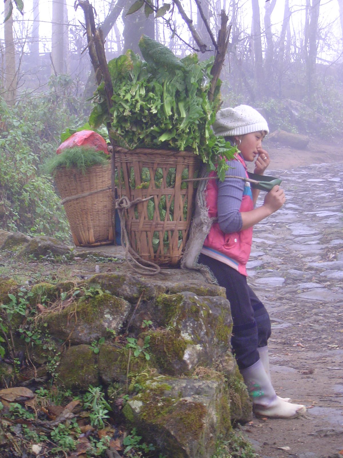 Catching a breath on the way uphill to the market.