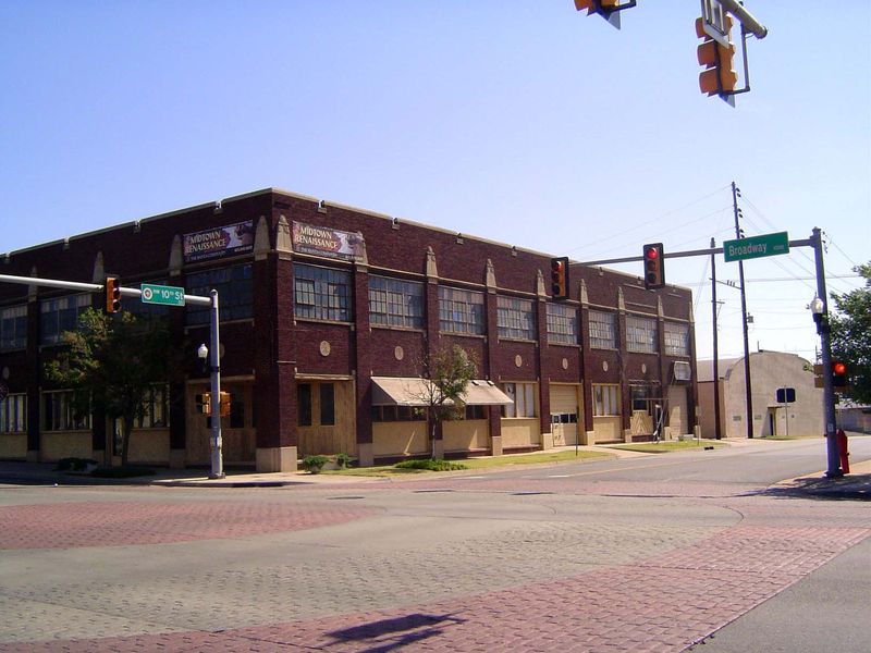Across the street from it, here's Chieftain Motors, a Pontiac dealership from 1927.