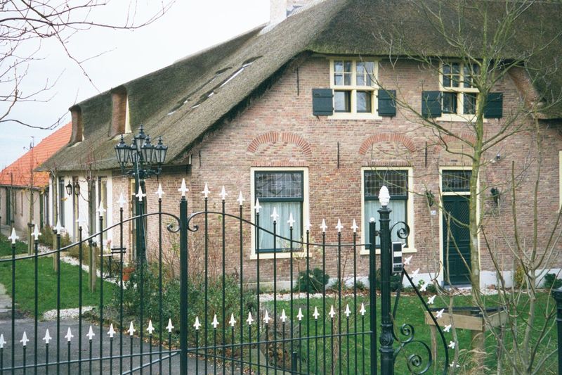 Another example. Why they should all have wrought-iron fences tipped in white is a mystery.