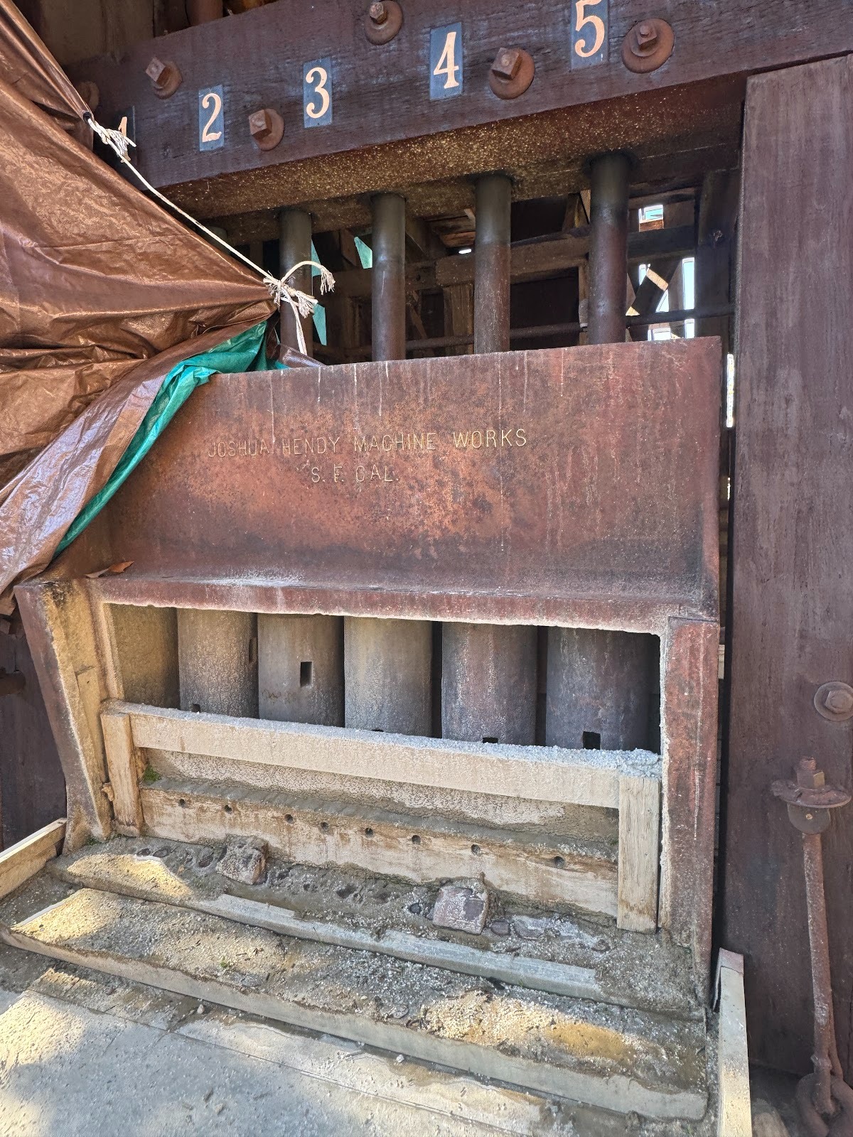 Here, according to the posted description, are the 1,000-lb hammers that a camshaft raised and dropped eight inches 100 times a minute.  Noi