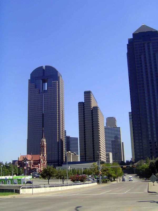 All three of these buildings—JPMorgan Chase from 1986, the San Jacinto Center from 1982, and the Trammell Crow Building from 1985—were built