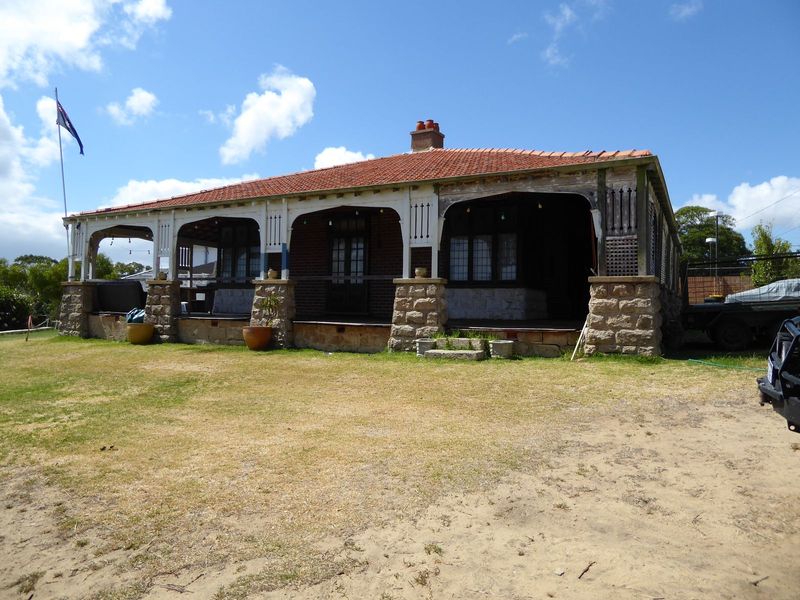 Here's a house built perhaps in 1920 for someone who spent time outside.