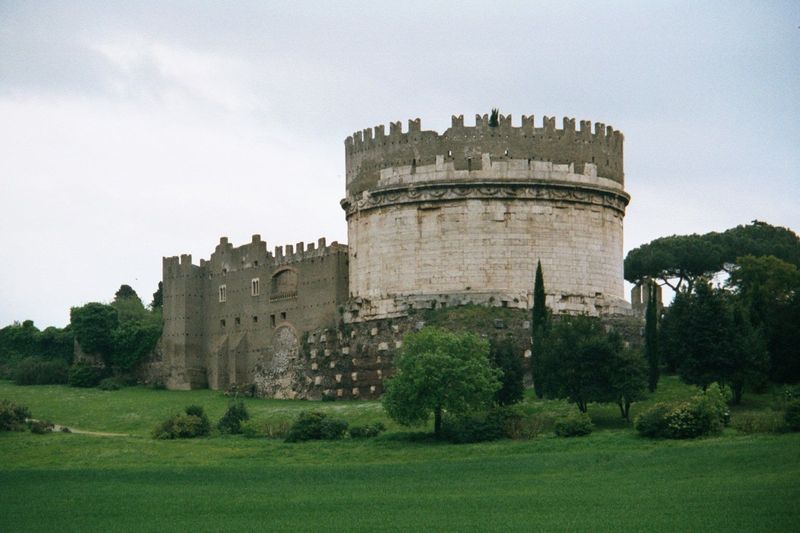 Along the road, the first-century B.C. tomb of Cecilia Metella. A presumably conical roof is long gone. In the 13th century the cylindrical 