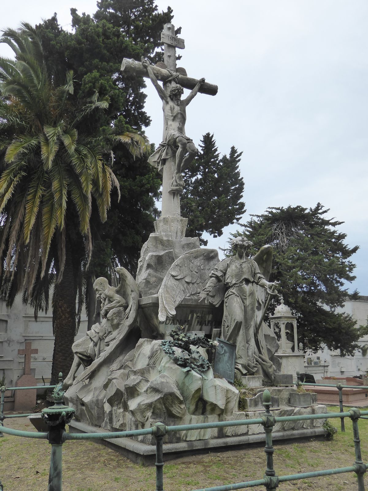Here's a monument with the unusual sight of a geriatric angel, his wings still in good shape.