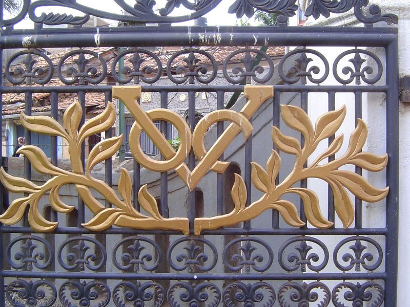 The church gates carry the insignia of the United East Indies Company. The same logo can be seen in both Jakarta and Delft.