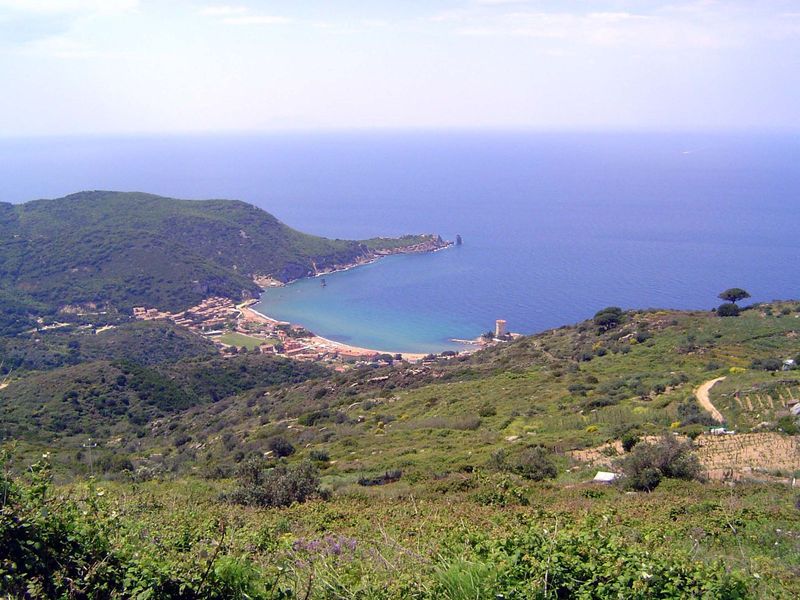 The view from Castello down to the island's west coast, facing the infinite Mediterranean. This is the island's best beach, which is why mos