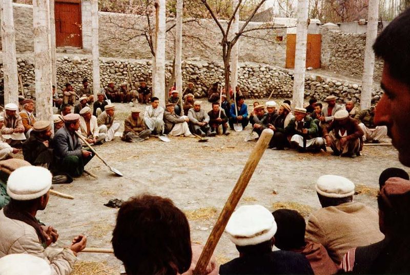 Villagers discussing channel maintenance.