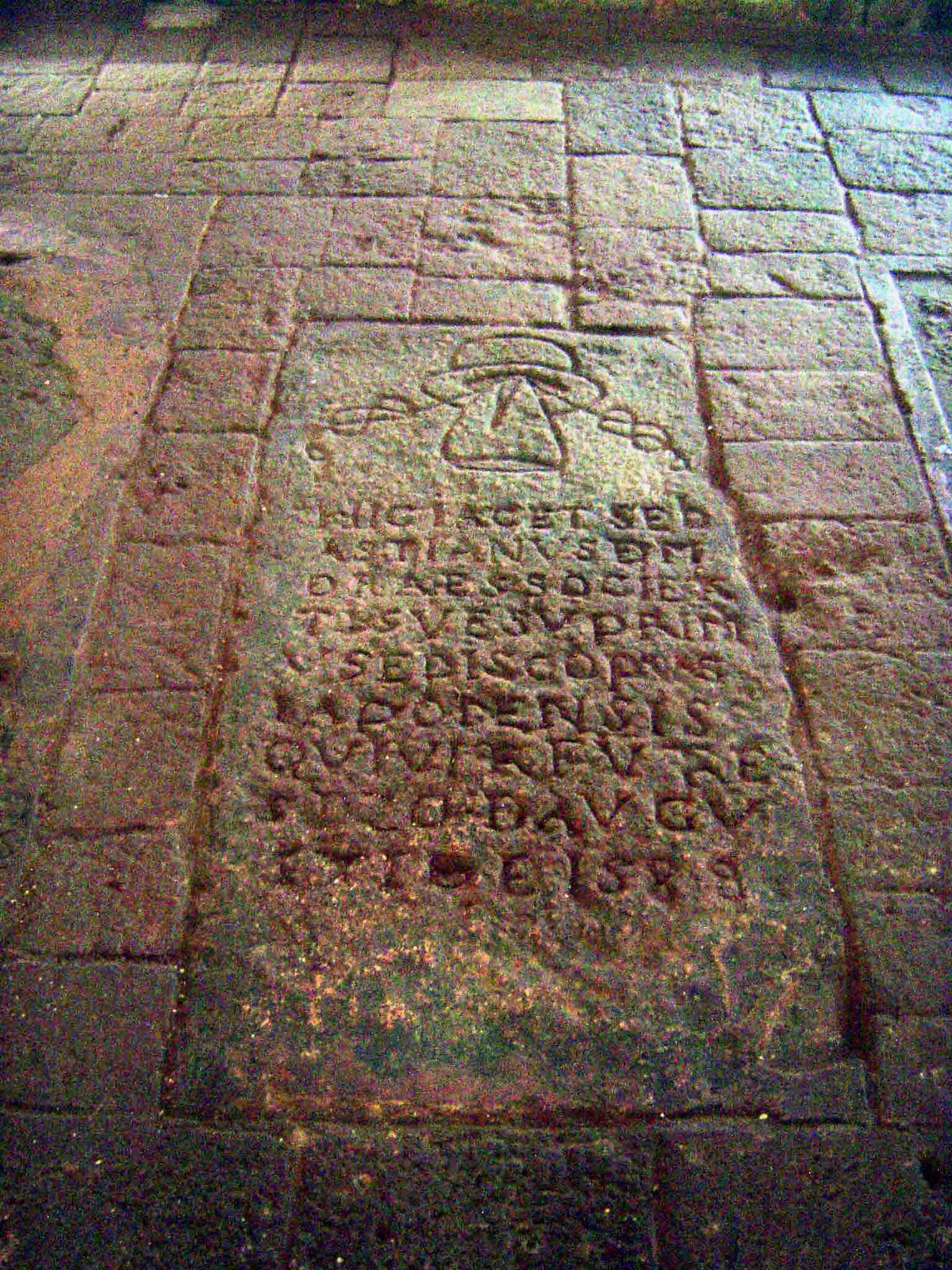 Tombs are lined up on the floor.