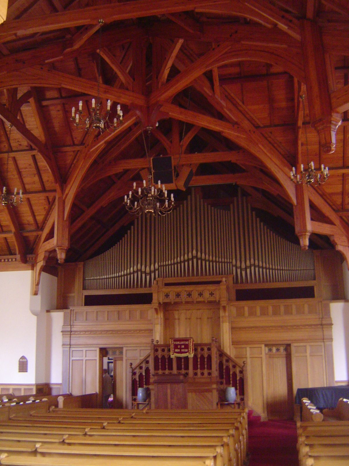 The interior is a masterpiece of carpentry, although you'd swear that hoteliers have come by, pointed up, and said, "That's what I want for 