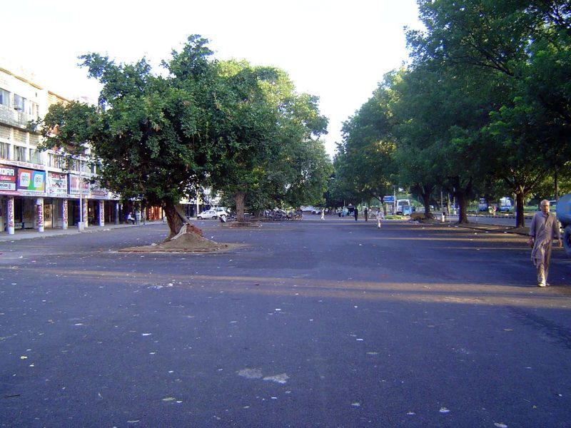 Shopping was handled not in centers but along certain streets. On the right is the main road separating two superblocks. In the center is th