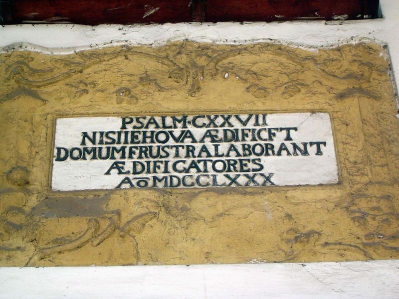 Over the entrance there's a fragment from Psalm 127: "Except the Lord build the house, the builders labor in vain."