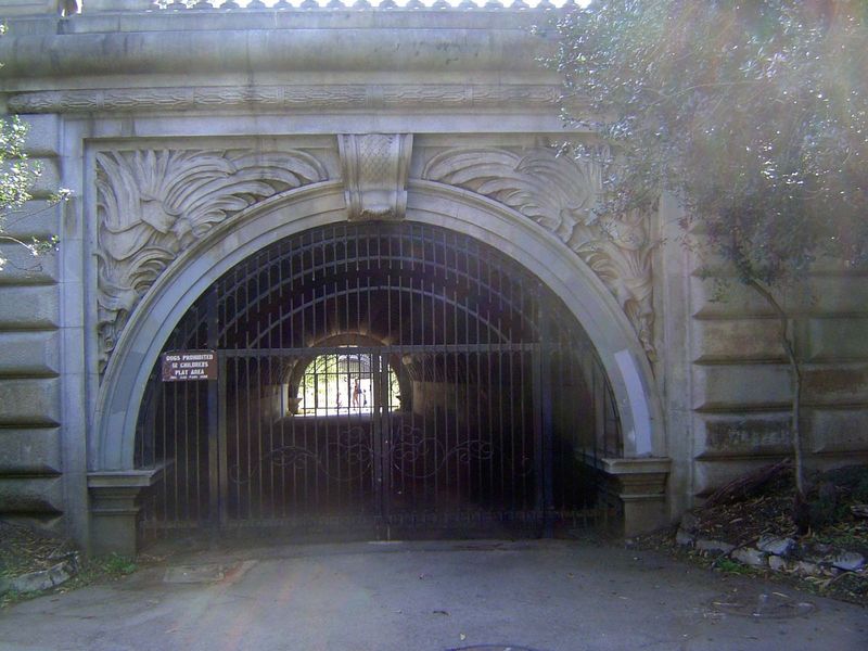 The boy continued into the park through this tunnel, barred shut now but then resounding to suitably high-pitched shrieks.