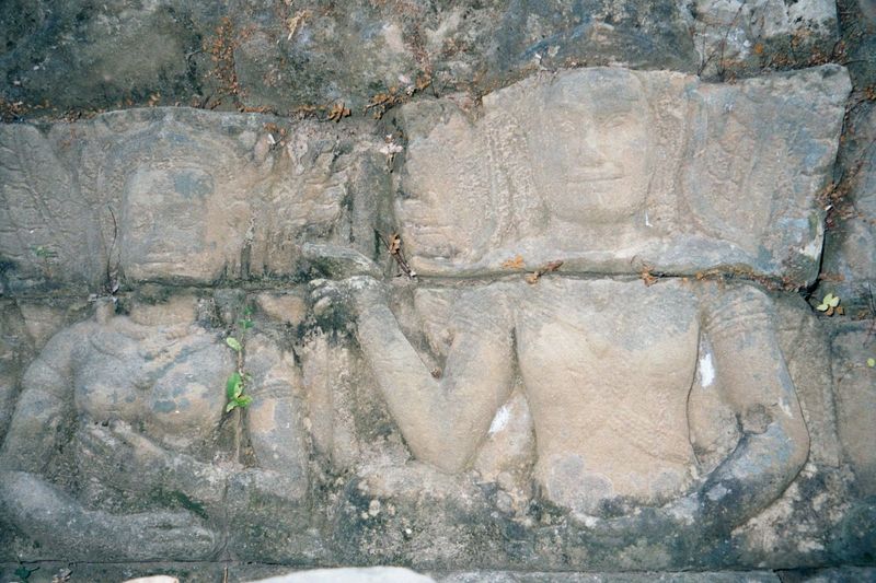 The south wall of the pool is rimmed with reliefs.