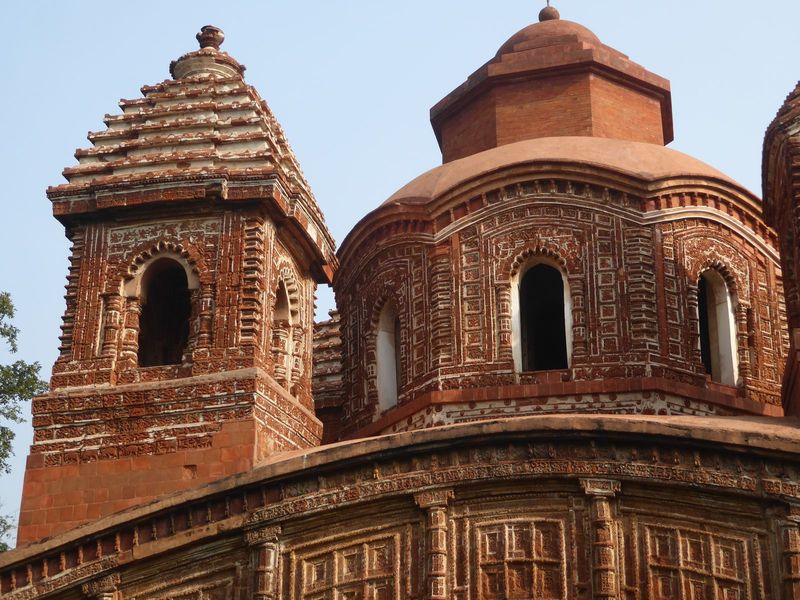 Ghosh argues that the lower story contained a conventional shrine or garbha, literally the womb. This allowed the "upper structure to functi