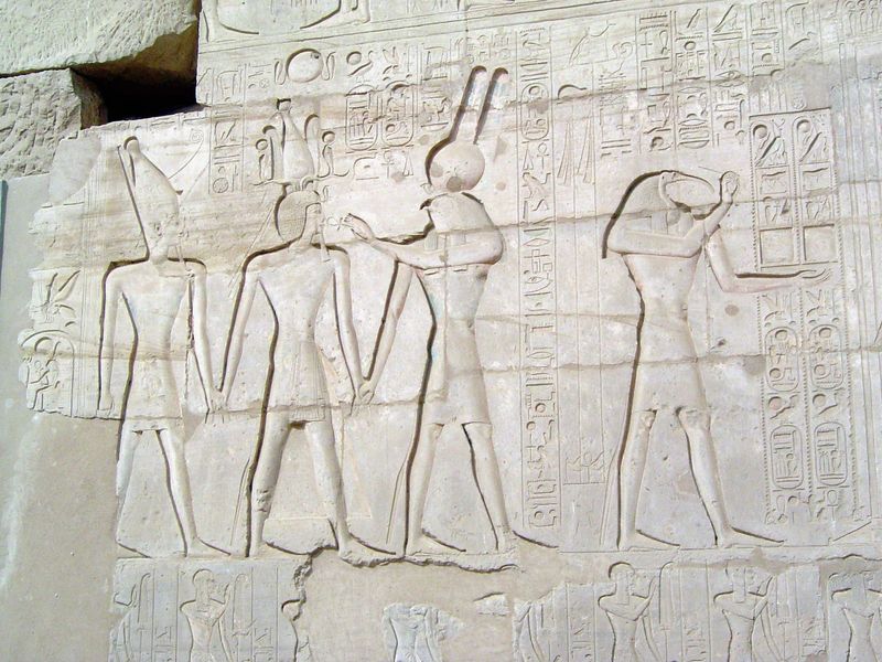 A closer view of the escort party. On the right, the ibis-headed Thoth, scribe of the gods, pen in hand.