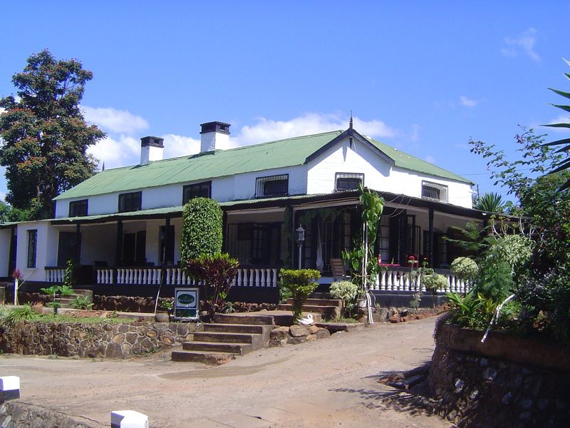 A bungalow-like hotel, close to the government offices.