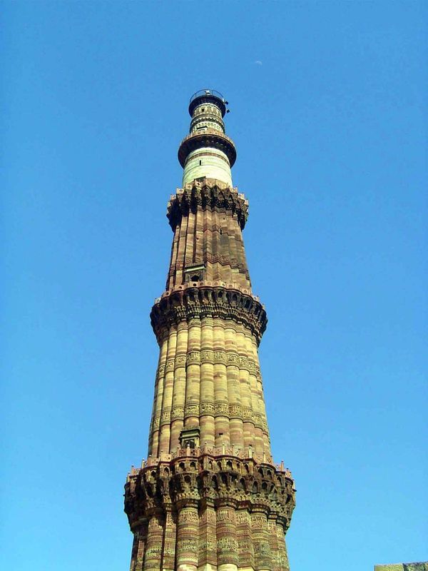 The two top stories are cylindrical and of marble. The view from up there—at the top, about 240 feet high—looks over the extensive ruins of 