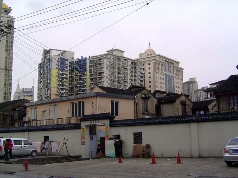 Just outside: housing of two generations. Go through the gate?