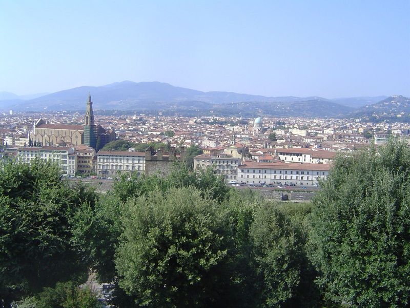Santa Croce is on the left and the city's unheralded, green-domed mosque has come into view. The hills in the background are Fiesole.