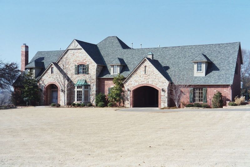 This is what you can get for a million dollars: a rancher-cum-castle, with a tunnel leading into the keep—oops, garage.