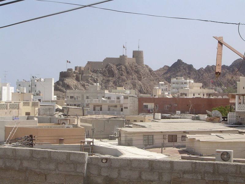 Looking over the roof of the market to Muttrah Fort.