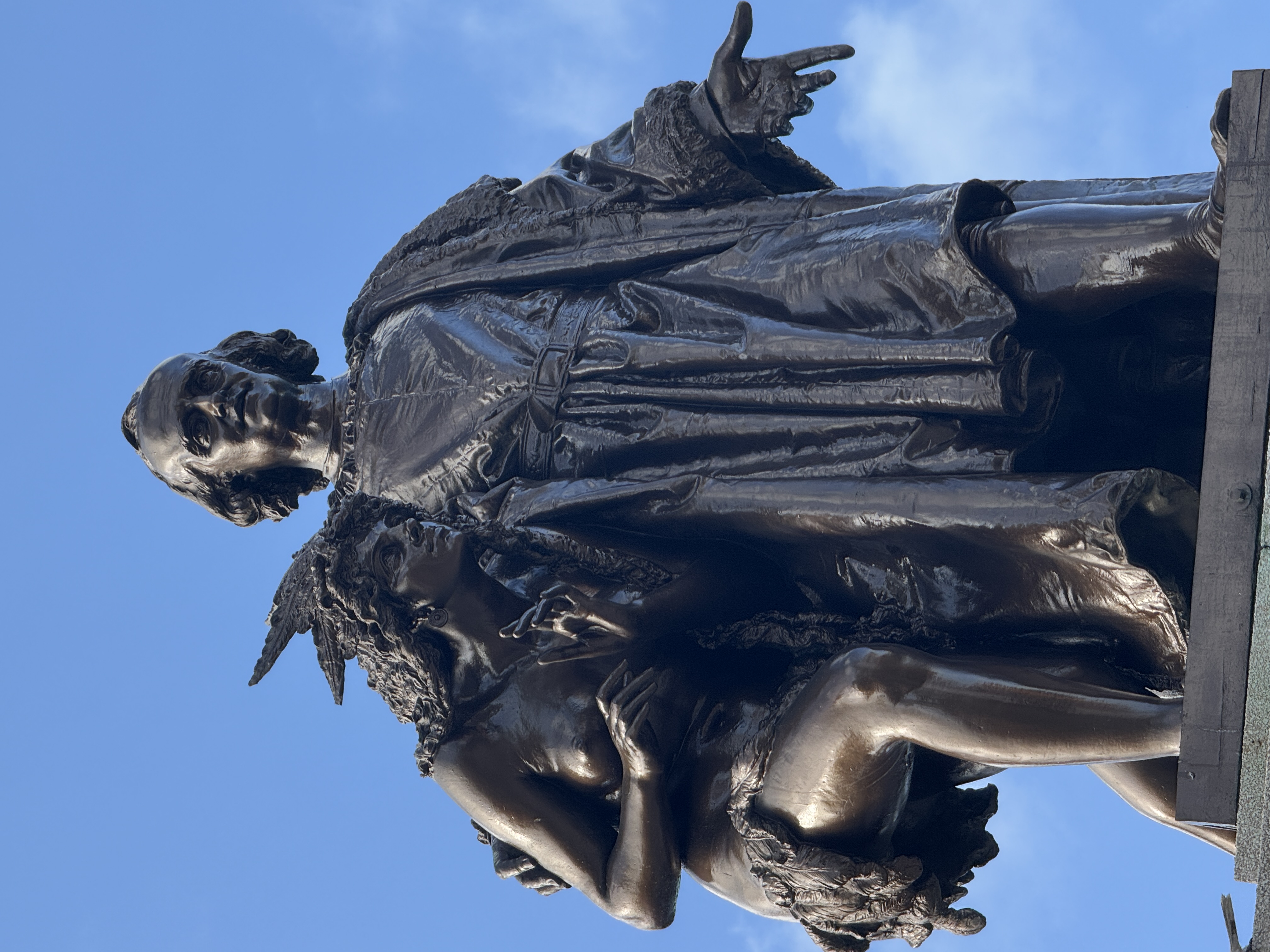 Columbus looks more avuncular than heroic, but the Indian maiden still seems afraid.  Smart lady.