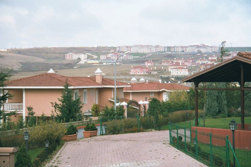 Single-family dwellings. The distant hills are in the path of an urban tidal wave.