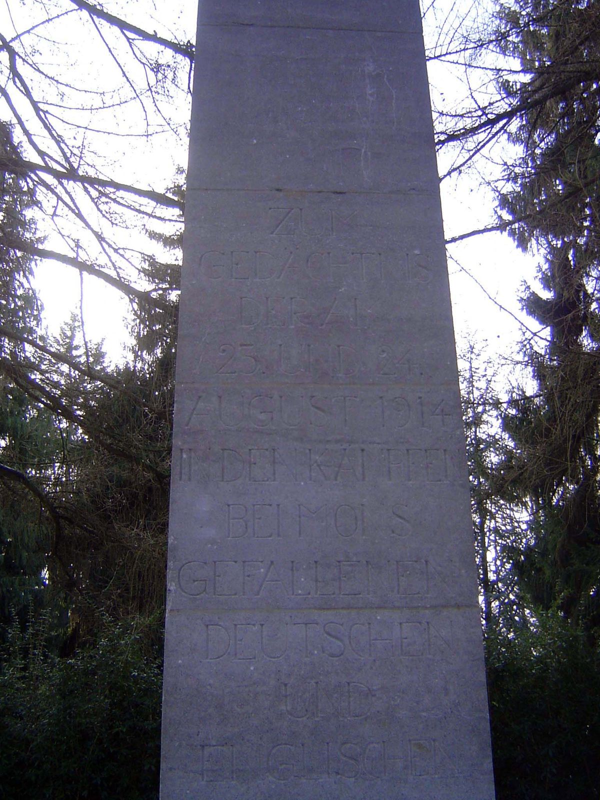 The Germans began the cemetery and erected this central monument. "In memory of the German and English soldiers who fell in the actions near