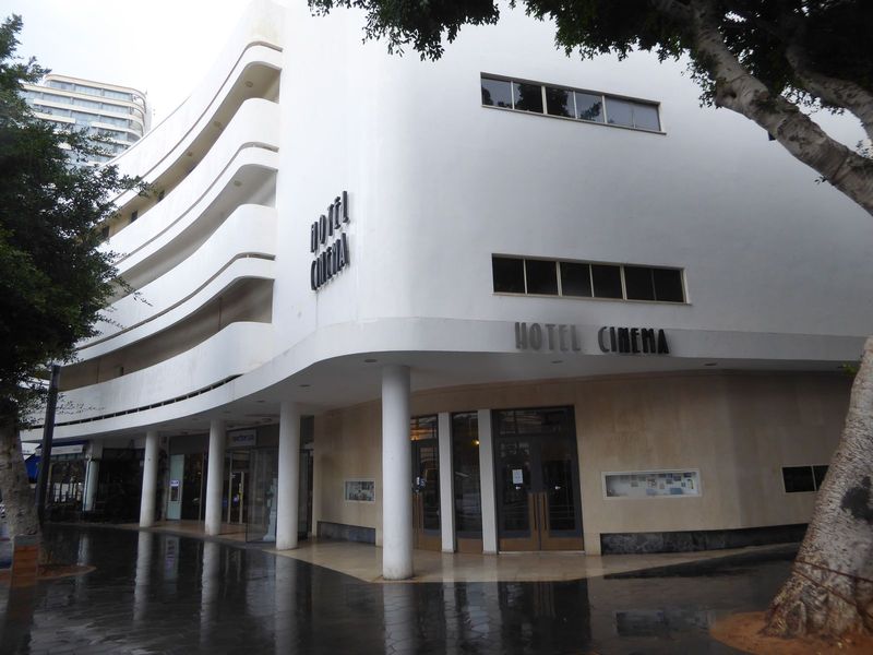 The buildings around the circular square include the former Esther Cinema, which opened in 1939 as an air-conditioned cinema showing Snow Wh