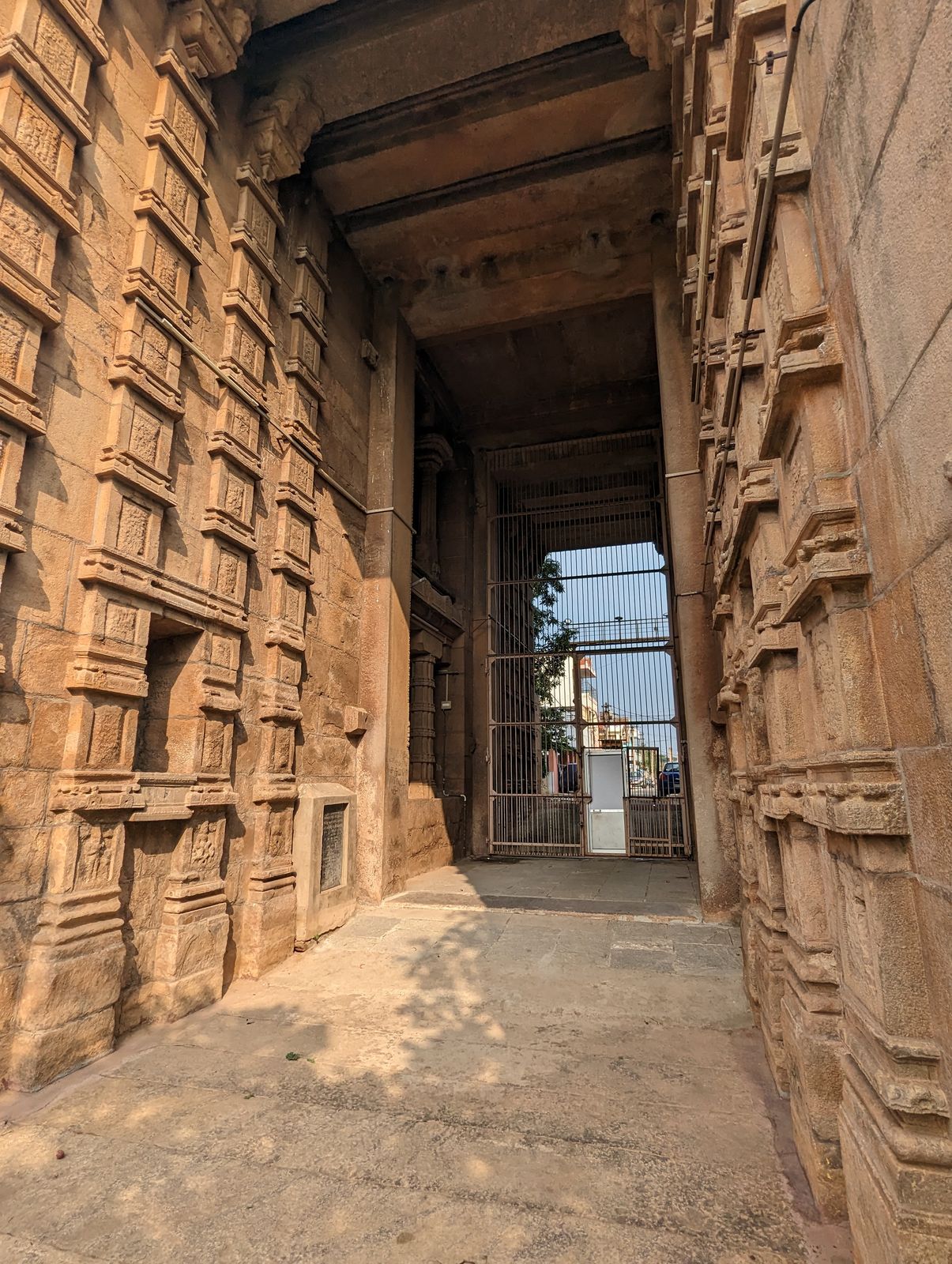 Notice the flat surface of the most distant column.  It's one of four jambs placed as anchors when construction of a gopuram begins.  We'll 