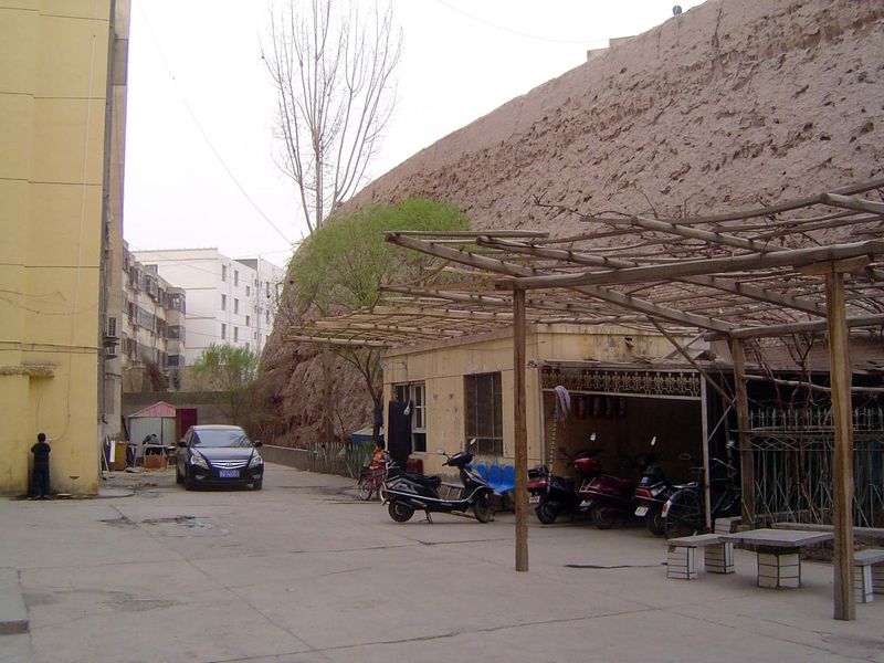 Kashgar was once walled, but only short lengths of wall remain, in this case hemmed in by housing blocks whose residents probably see the wa