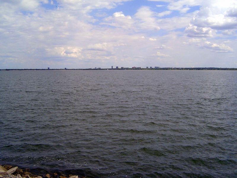 Looking south from the dam across the reservoir. It may look like a lot of water, but the city long ago reached still farther afield and in 